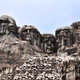 Image for article titled Japan's creepy cowboy theme park has a rotting Mount Rushmore and a John Wayne robot